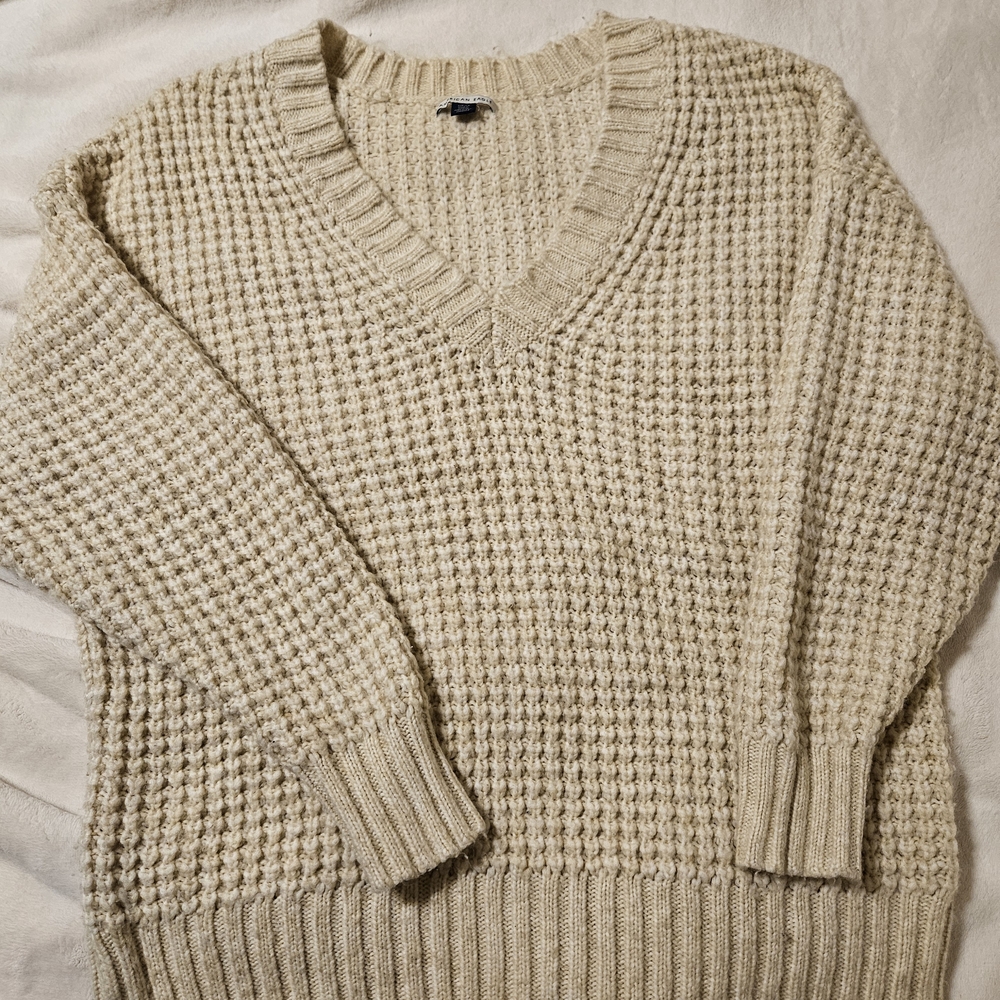 American Eagle Outfitters V-Neck Sweater in Cream, Oversized Fit.
